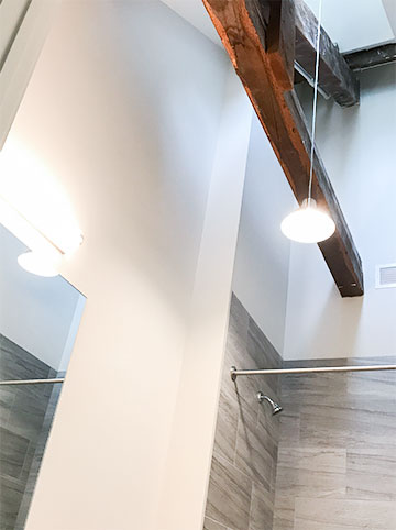 Taking advantage of the unique architecture in each unit, skylights dot the ceilings of top level apartments in Liberty House